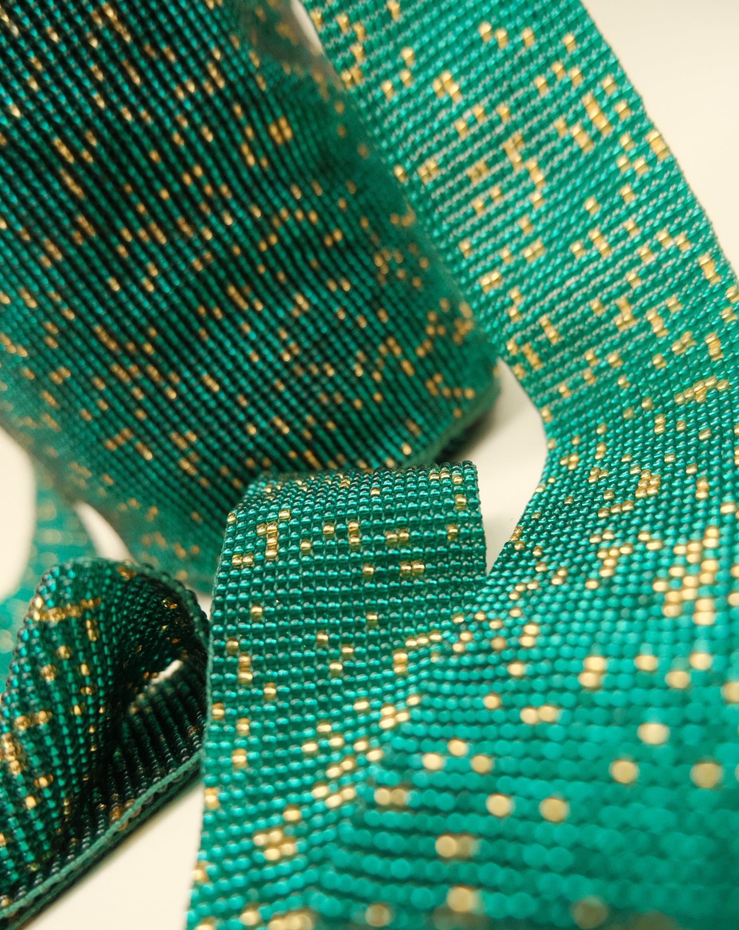 GREEN AND GOLD BEADED MOCHILA