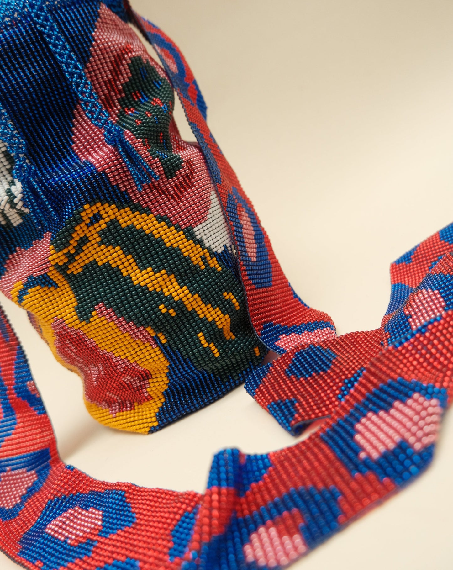 WILD PAPAYA BEADED MOCHILA
