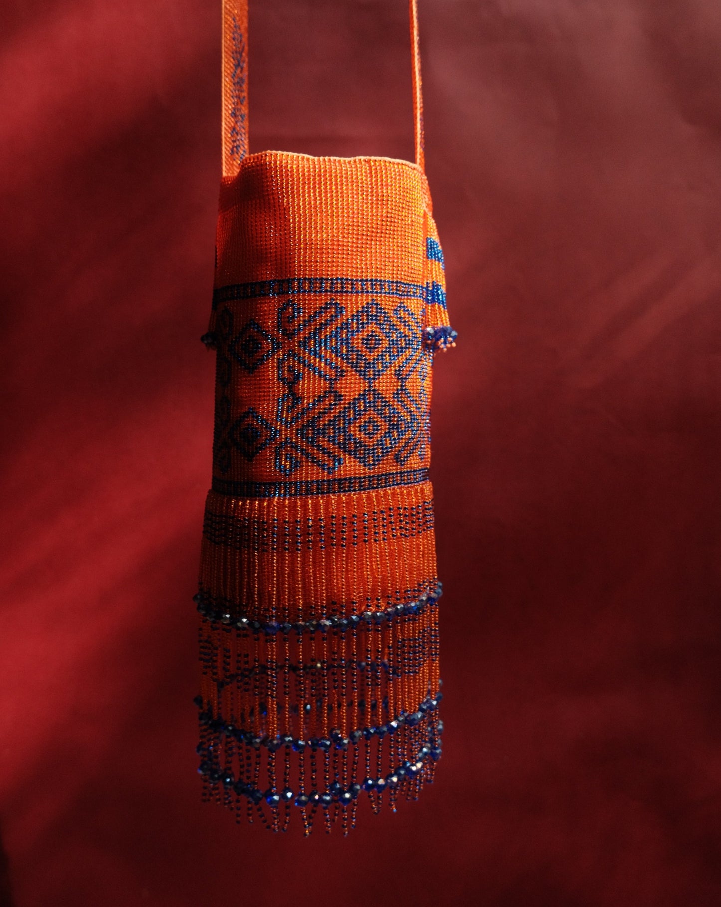 ORANGE AND BLUE TASSELS BEADED MOCHILA