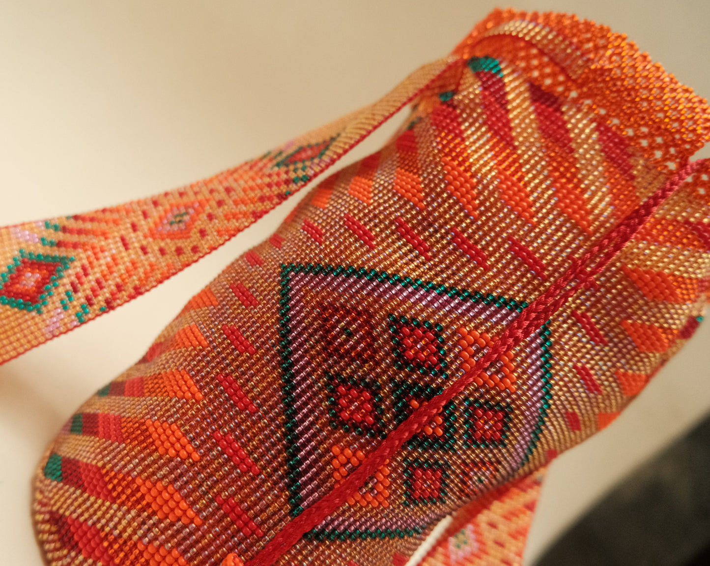 ORANGE AND RED NATIVE BEADED MOCHILA